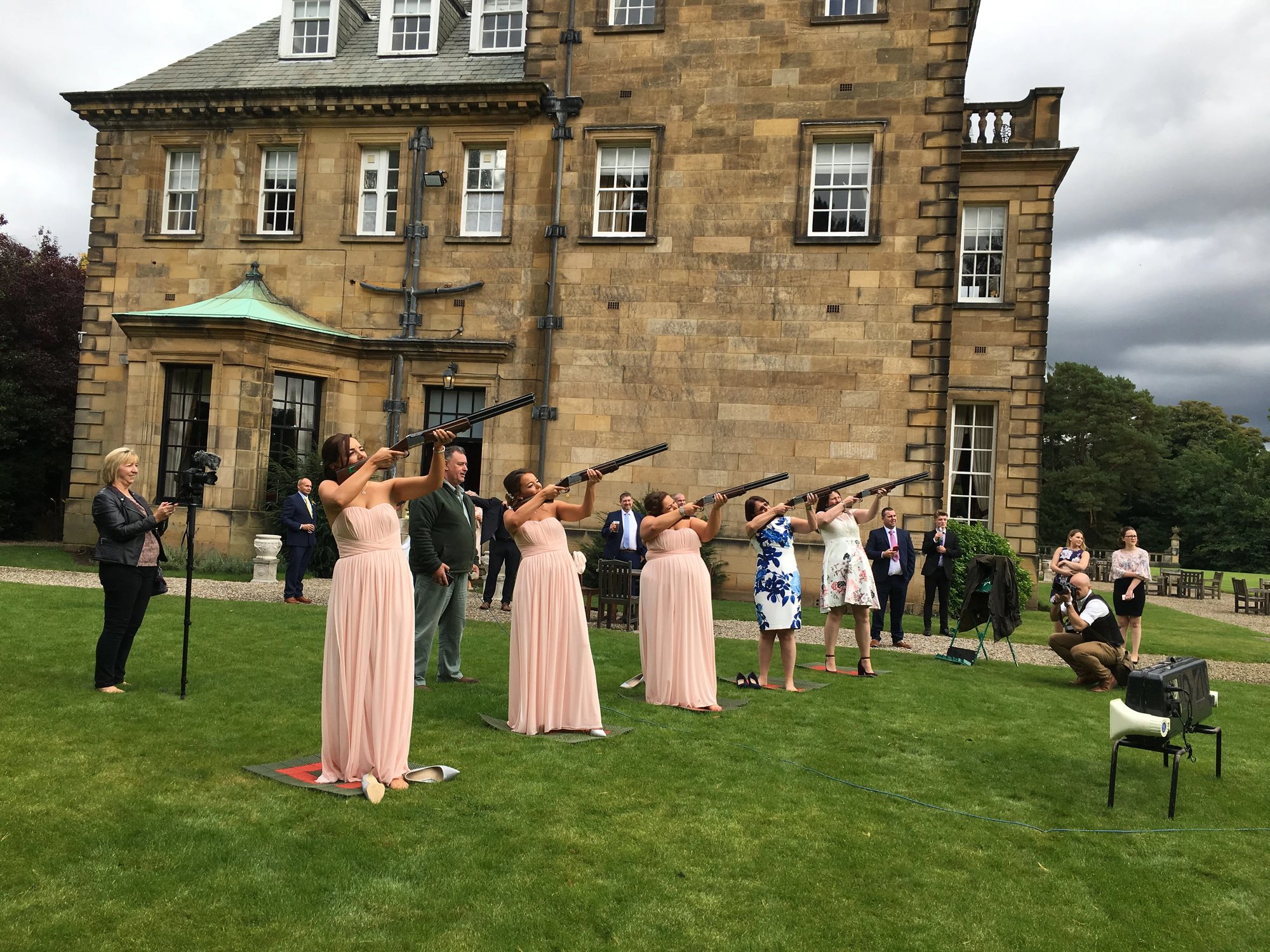 Guests taking aim during an LMS laser clay shooting session